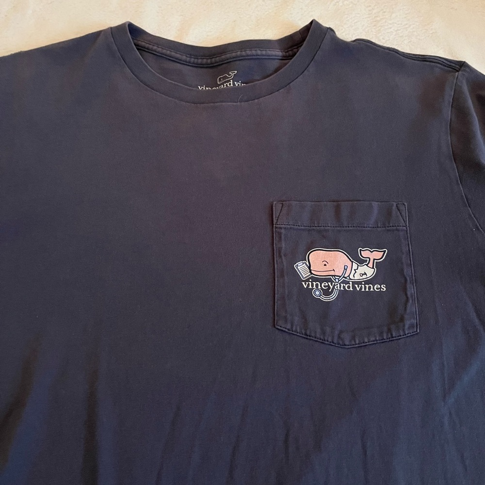 Vineyard Vines women’s medium shirt.